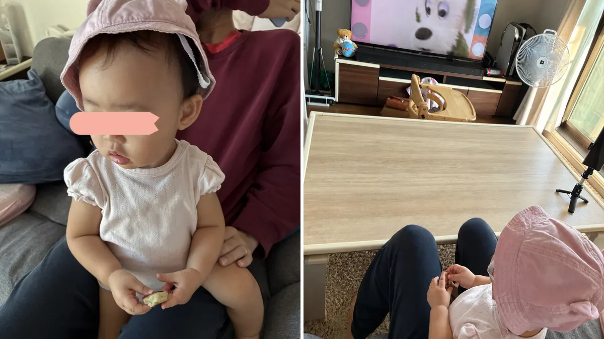 家で帽子をかぶってテレビを見る1歳3ヶ月の娘